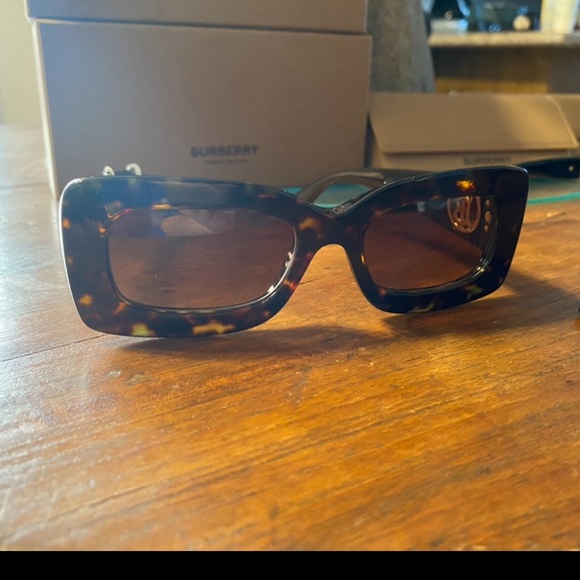 Small square tortoise brown Burberry sunglasses w/ the gold details. - Picture 2 of 2